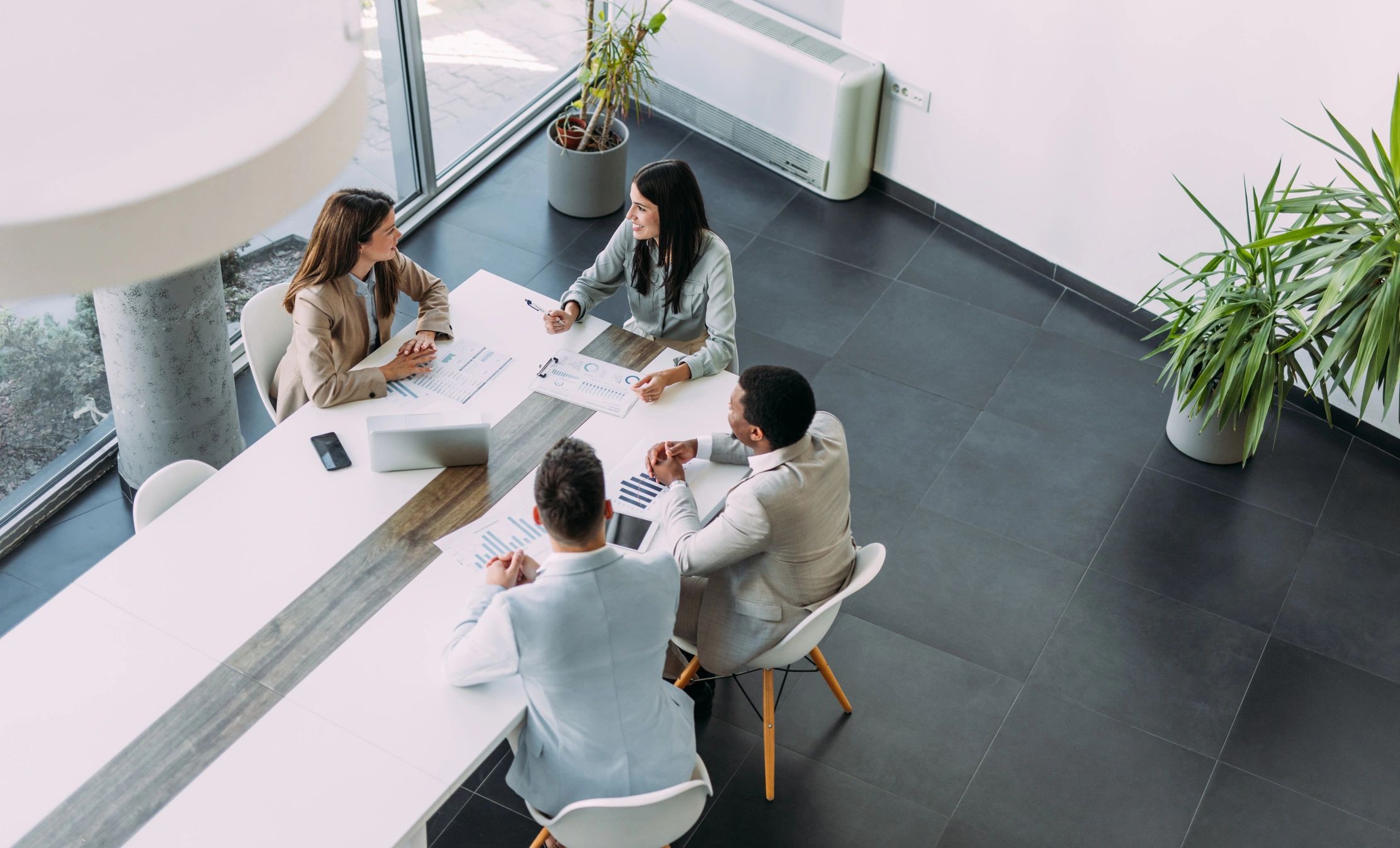 Business leaders collaborating around a conference table